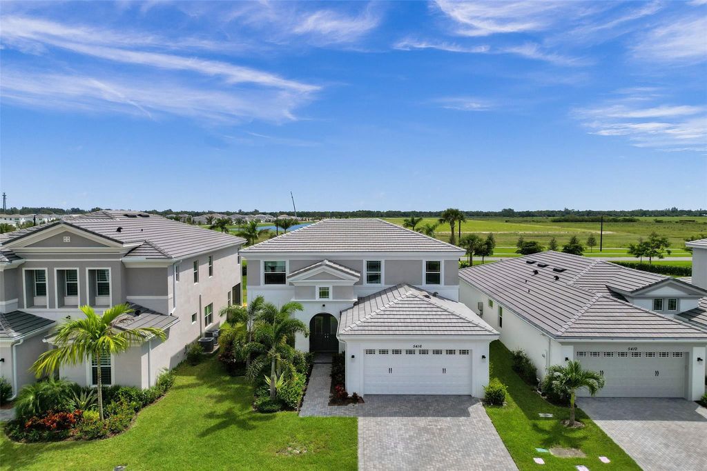 Photo of 5416 Macoon Way, The Acreage, FL 33470 (MLS # B26049828)