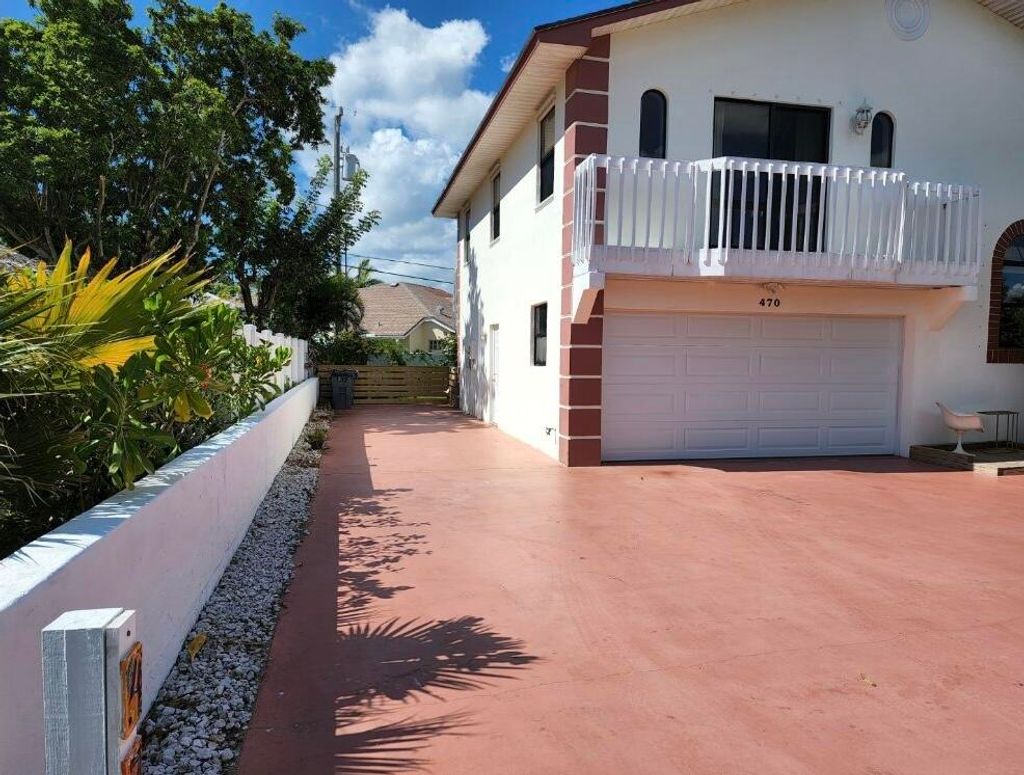 Photo of 470 S Mars Way NE, Juno Beach, FL 33408 (MLS # R11145171)