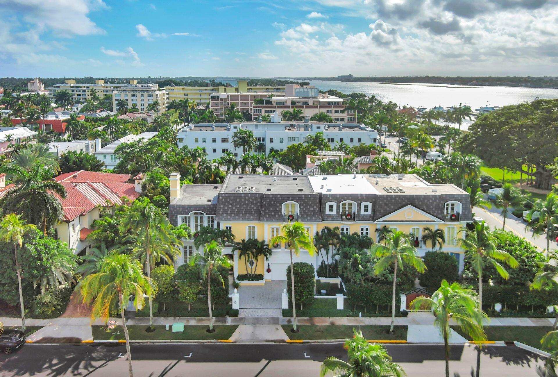 In town living at its best! Beautiful 3 story townhome steps from the Intracoastal and close to Worth Avenue restaurants and shops. Boasting 6000+/- square feet, this private oasis offers 4 bedrooms with lovely balconies. (one bedroom has been converted to an office/library, but can be easily switched back) 4 full baths and 1 half bath. The living room terrace offers an idyllic oasis for outdoor entertaining overlooking the pool and beautifully landscaped gardens. A true gem in the best