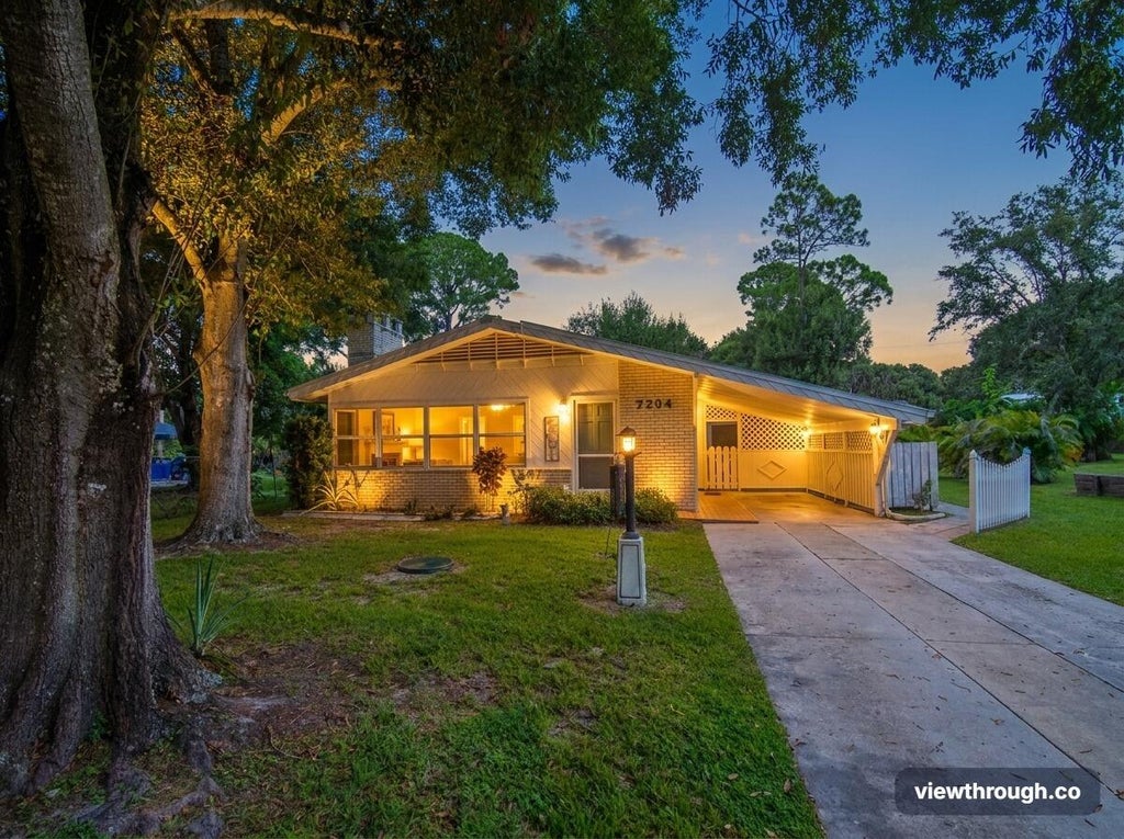 Photo of 7204 PASO ROBLES Boulevard, Fort Pierce, FL 34951 (MLS # B26065781)