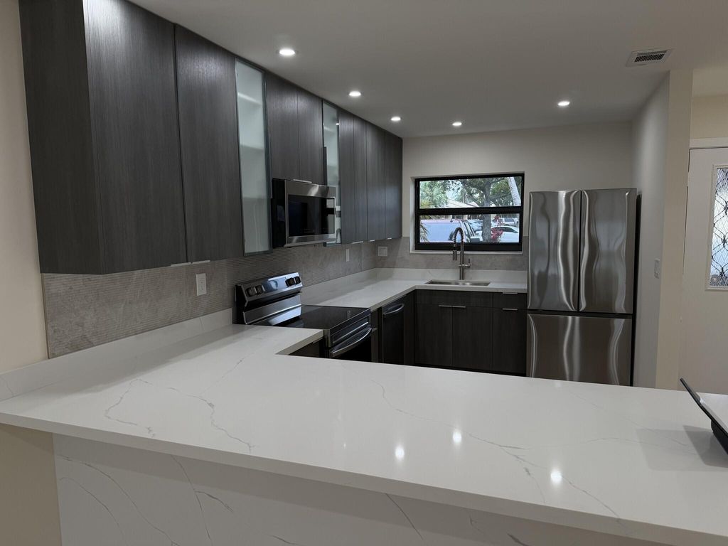 Photo of 705 Banks Road, Margate, FL 33063 (MLS # B26006143)