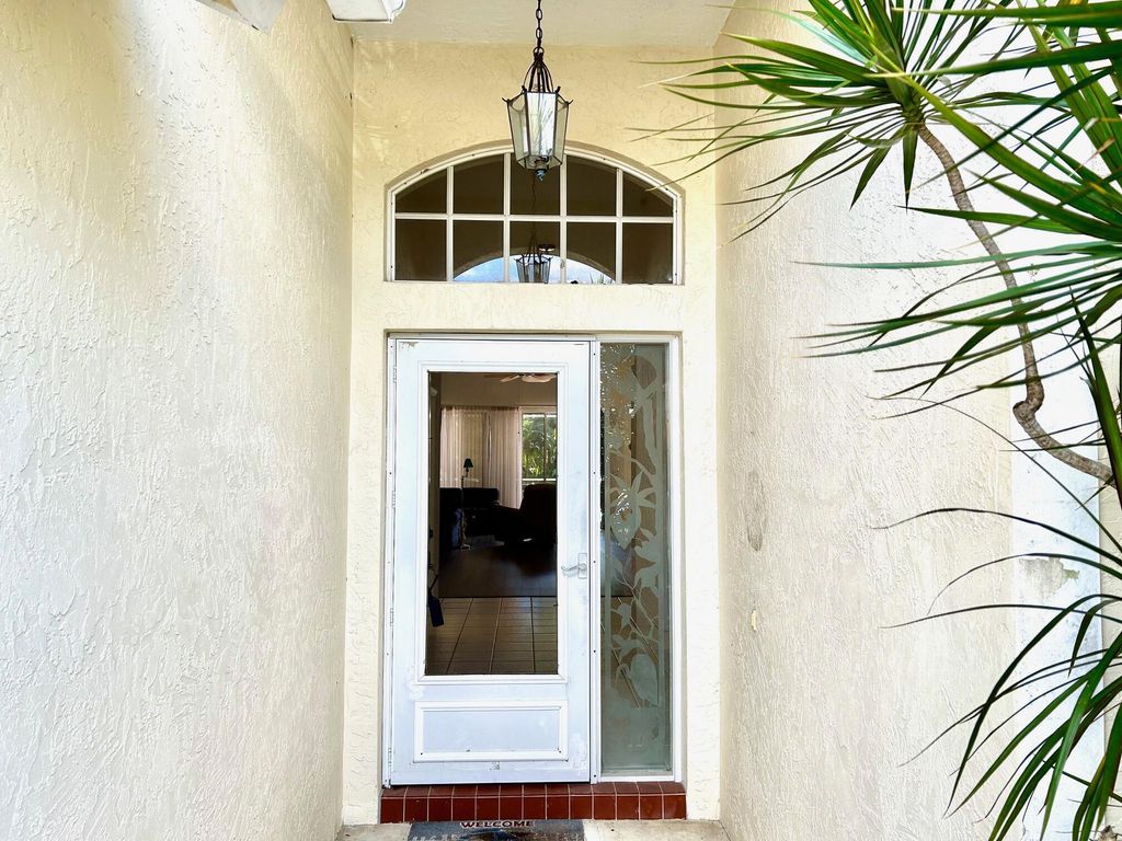 Photo of 5098 SE Devenwood Way, Stuart, FL 34997 (MLS # R10959765)