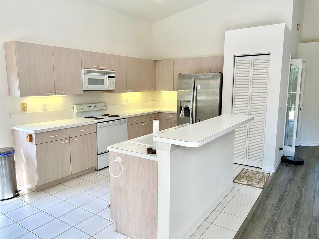 Photo of 5098 SE Devenwood Way, Stuart, FL 34997 (MLS # R10959765)