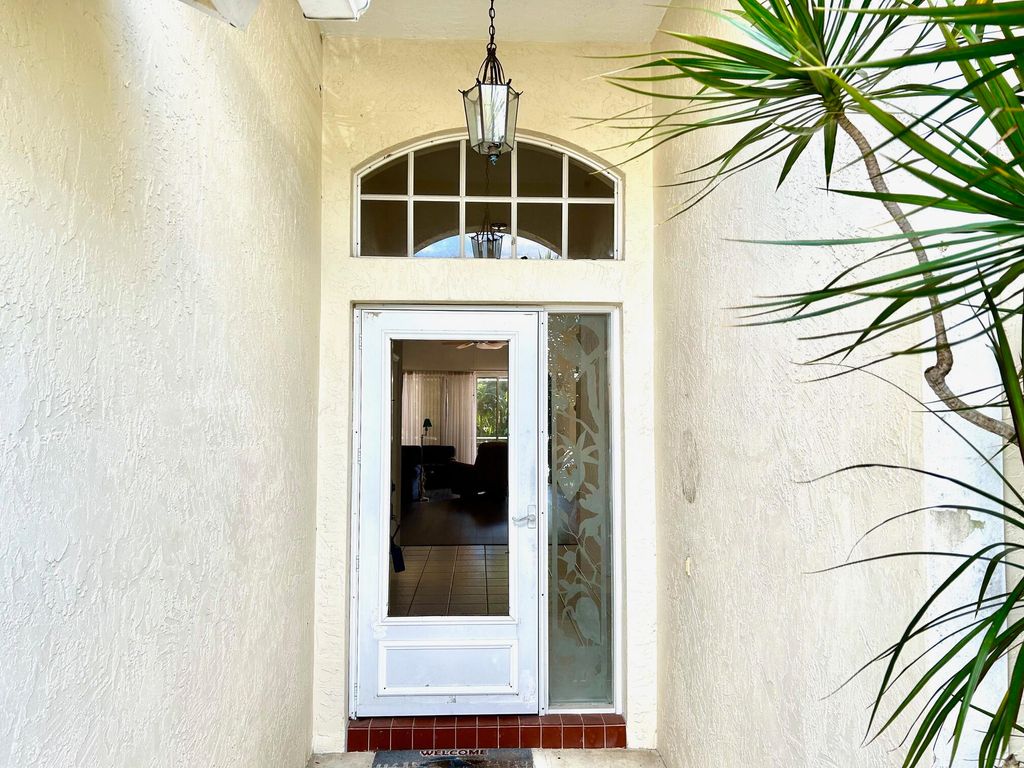 Photo of 5098 SE Devenwood Way, Stuart, FL 34997 (MLS # R10959765)