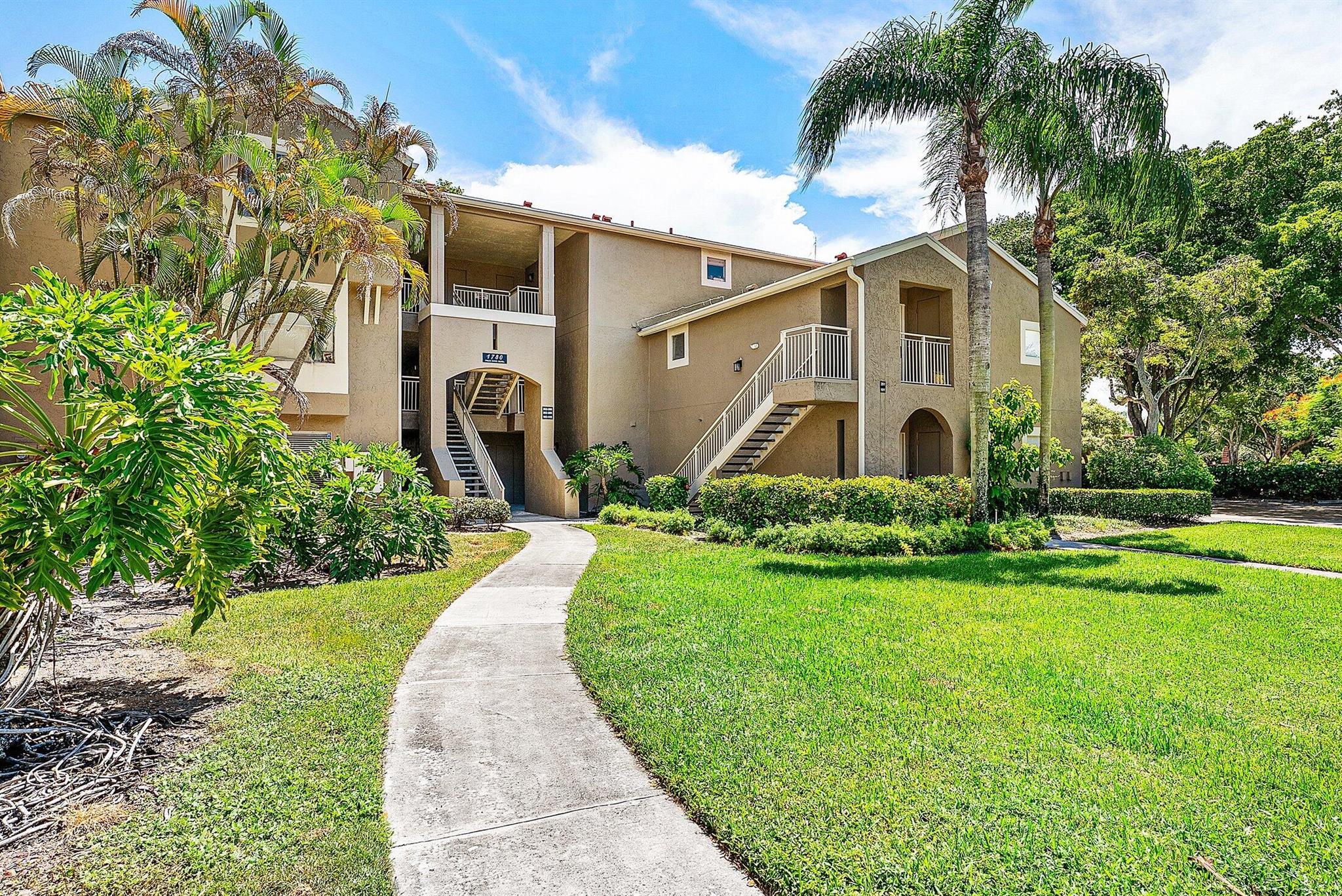 Beautifully maintained 2 bed, 2 bath first-floor condo with tranquil garden views in the gated community of Verano at Delray Beach. This spacious unit features walk-in closets, a Roman tub, in-unit washer and dryer, and a large screened-in patio perfect for relaxing outdoors. Enjoy resort-style living with community amenities including a pool, tennis and volleyball courts, and scenic walking paths with benches throughout. A/C is less than 5 years old and washer/dryer are newer as well. Unbeatable location--just minutes to the beach, I-95, and vibrant Atlantic Ave's dining and shopping scene. Investor friendly--can be rented right away! Don't miss this opportunity!