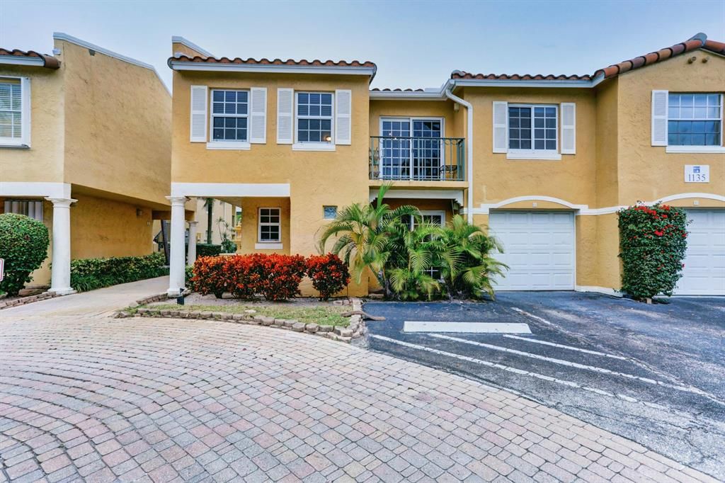 Photo of 1135 Lake Shore Drive #105, Lake Park, FL 33403 (MLS # R10683627)