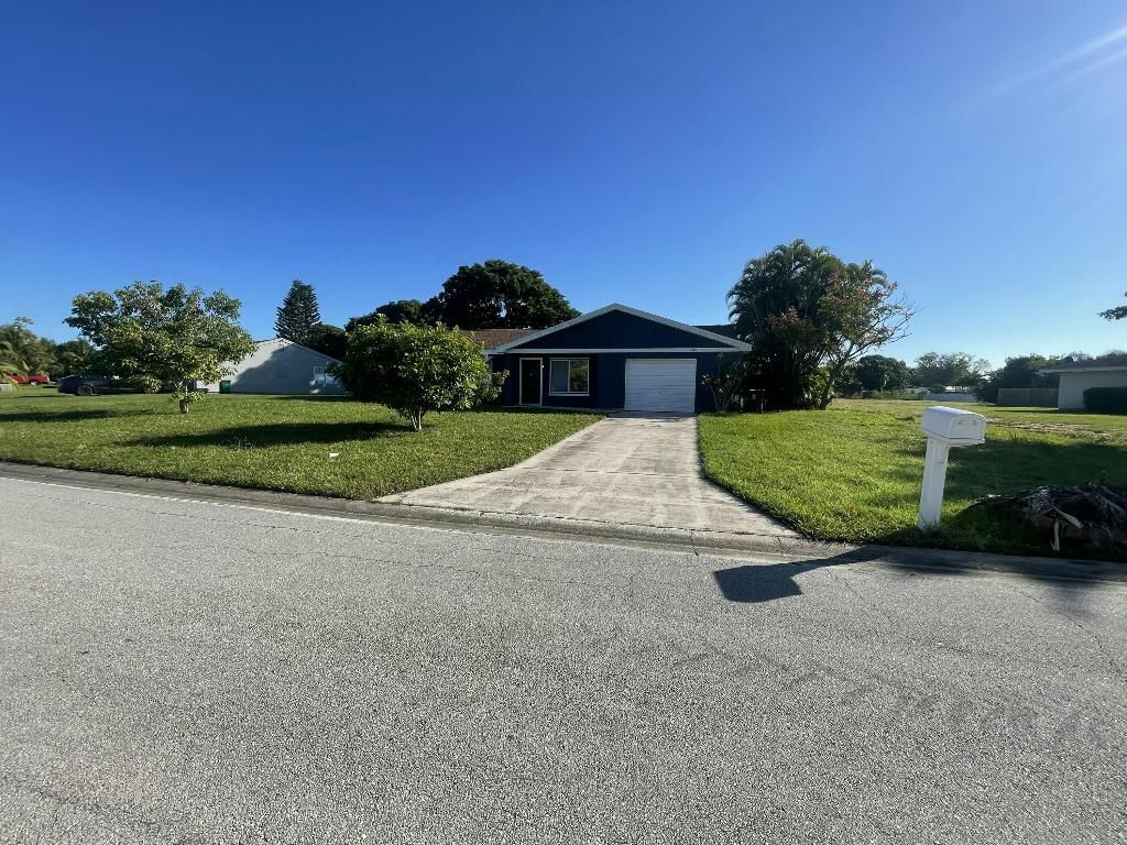 Photo of 1849 SE Rainier Road, Port Saint Lucie, FL 34952 (MLS # R11135792)