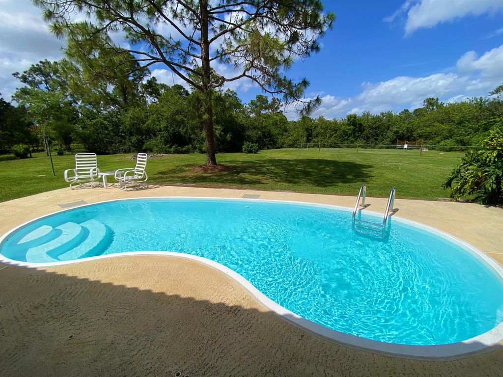 Photo of 13885 159 Street N, Jupiter, FL 33478 (MLS # R10972246)