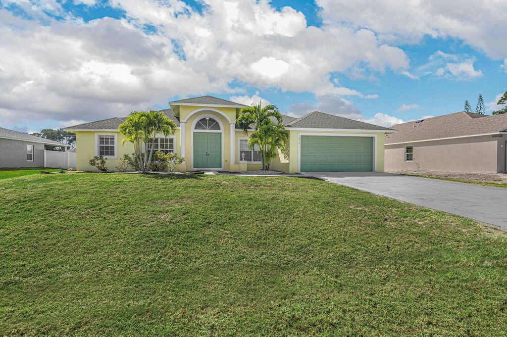 Photo of 1450 SW Santiago Avenue, Port St Lucie, FL 34953 (MLS # R10960961)