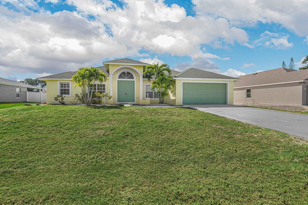 Photo of 1450 SW Santiago Avenue, Port Saint Lucie, FL 34953 (MLS # R10960961)