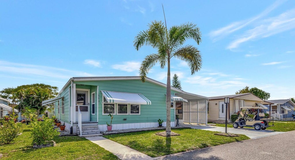 Photo of 511 Ann Marie Lane, Port Saint Lucie, FL 34952 (MLS # R11065164)