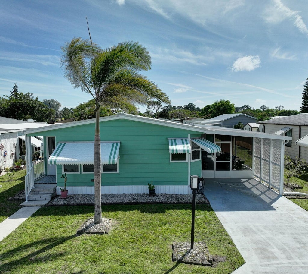 Photo of 511 Ann Marie Lane, Port Saint Lucie, FL 34952 (MLS # R11065164)
