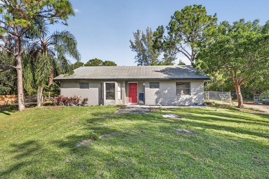 Photo of 11821 66th Street N, West Palm Beach, FL 33412 (MLS # B26093821)
