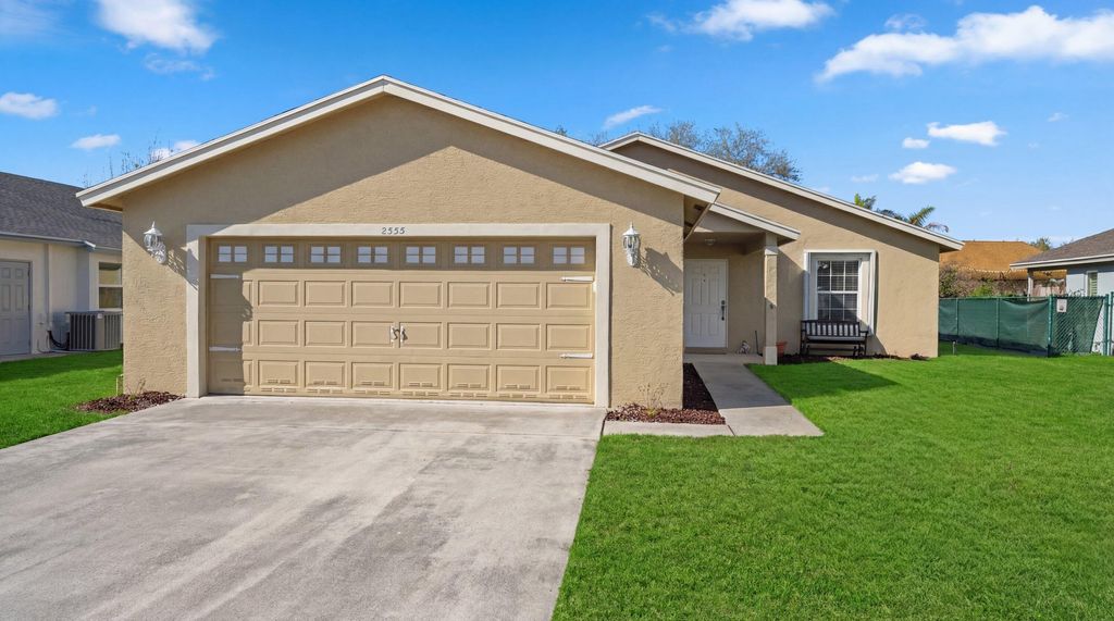 Photo of 2553 SW Regency Road, Stuart, FL 34997 (MLS # B26006971)