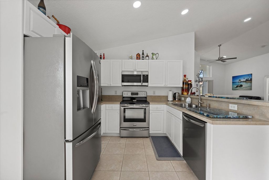 Photo of 2553 SW Regency Road, Stuart, FL 34997 (MLS # B26006971)