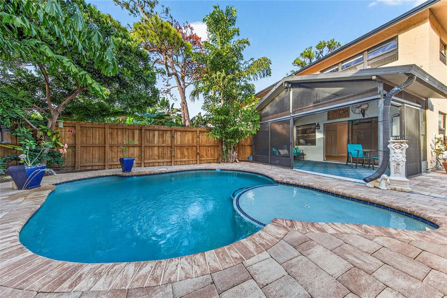 Rarely available corner end unit townhouse WITH ITS OWN POOL !  Desirable Wilton Pines townhome is centrally located between vibrant Wilton Drive and thriving Dixie Village arts and business district, also close to Pride Center.  Well run association, HOA fees $1,777/Quarter includes roof (new in 2023), wind & flood insurances, exterior maintenance & pest control, and RESERVES.  This unit has impact windows & doors, impact slider out to relaxing screened porch overlooking your pool.   Two bedrooms upstairs with 2 baths and full size stacked washer / dryer.  Half bath on first level.  Multiple pets OK, leasing after 1 year of ownership, easy parking for 3 vehicles in front of your townhome.