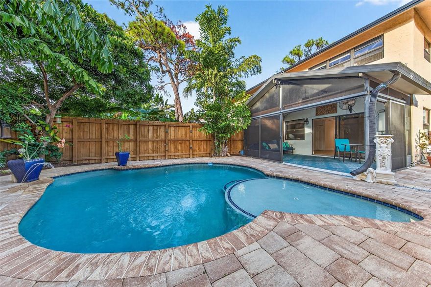 Rarely available corner end unit townhouse WITH ITS OWN POOL !  Desirable Wilton Pines townhome is centrally located between vibrant Wilton Drive and thriving Dixie Village arts and business district, also close to Pride Center.  Well run association, HOA fees $1,777/Quarter includes roof (new in 2023), wind & flood insurances, exterior maintenance & pest control, and RESERVES.  This unit has impact windows & doors, impact slider out to relaxing screened porch overlooking your pool.   Two bedrooms upstairs with 2 baths and full size stacked washer / dryer.  Half bath on first level.  Multiple pets OK, leasing after 1 year of ownership, easy parking for 3 vehicles in front of your townhome.