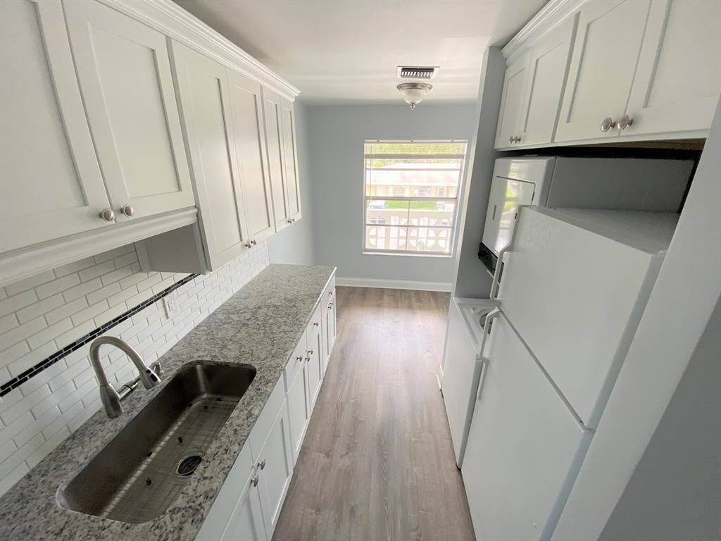 Photo of 1121 Cactus Terrace #203, Delray Beach, FL 33445 (MLS # R10729663)