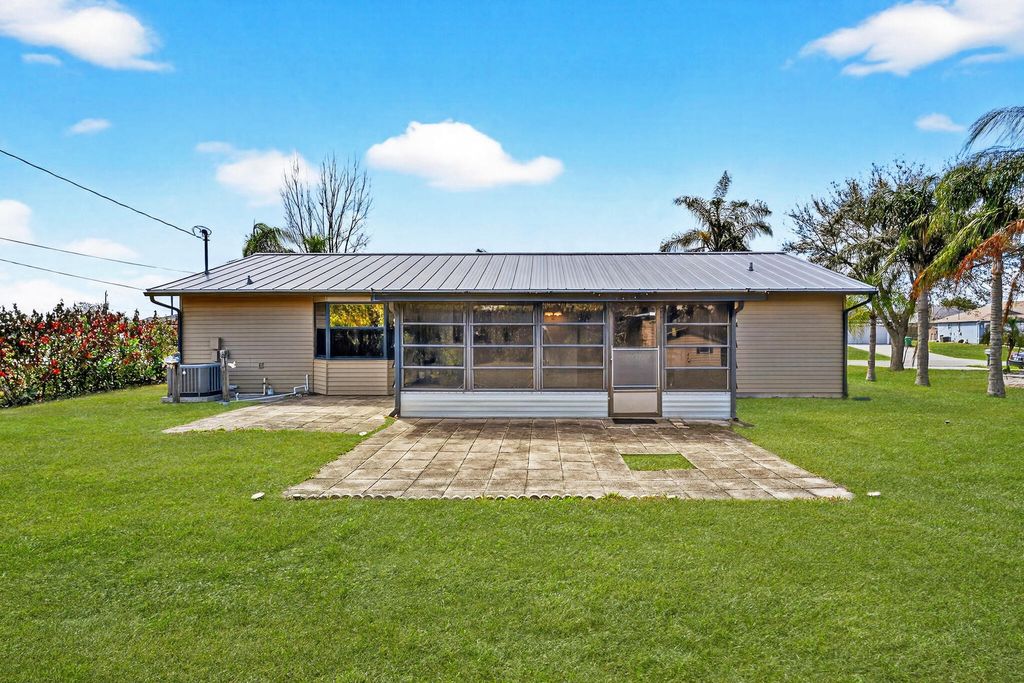 Photo of 456 SW Kestor Drive, Port Saint Lucie, FL 34953 (MLS # R11169682)