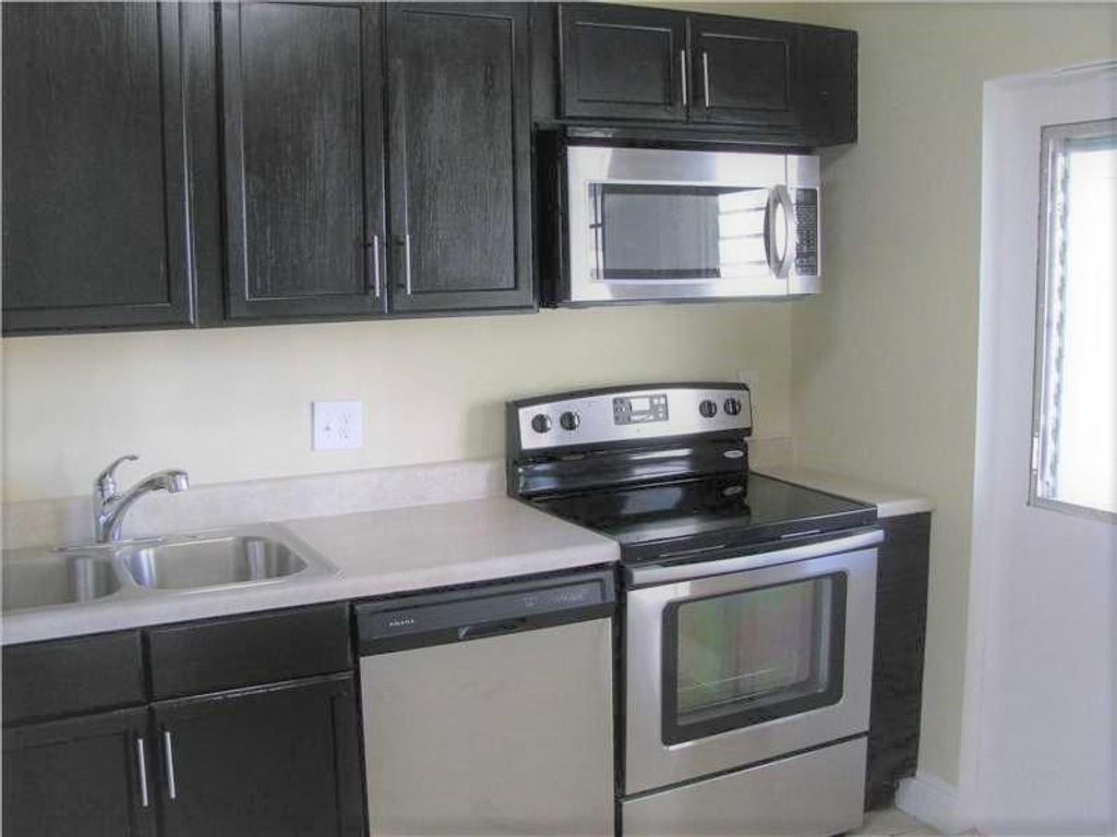 Photo of 2940 N Course Drive #604, Pompano Beach, FL 33069 (MLS # B26020451)