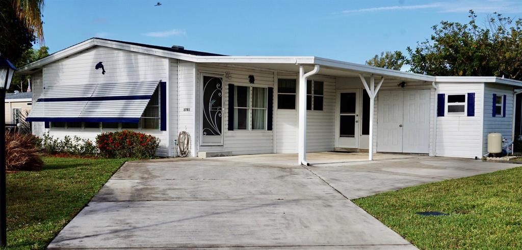 Photo of 3781 Honeysuckle Court, Port Saint Lucie, FL 34952 (MLS # R10880136)