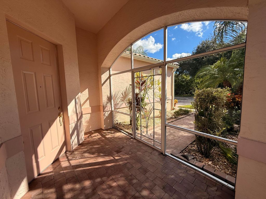 Photo of 633 NW Whitfield Way, Port Saint Lucie, FL 34986 (MLS # B26029353)