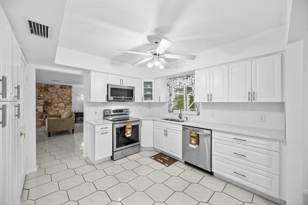 Photo of 1742 W Terrace Drive, Lake Worth Beach, FL 33460 (MLS # B26007998)