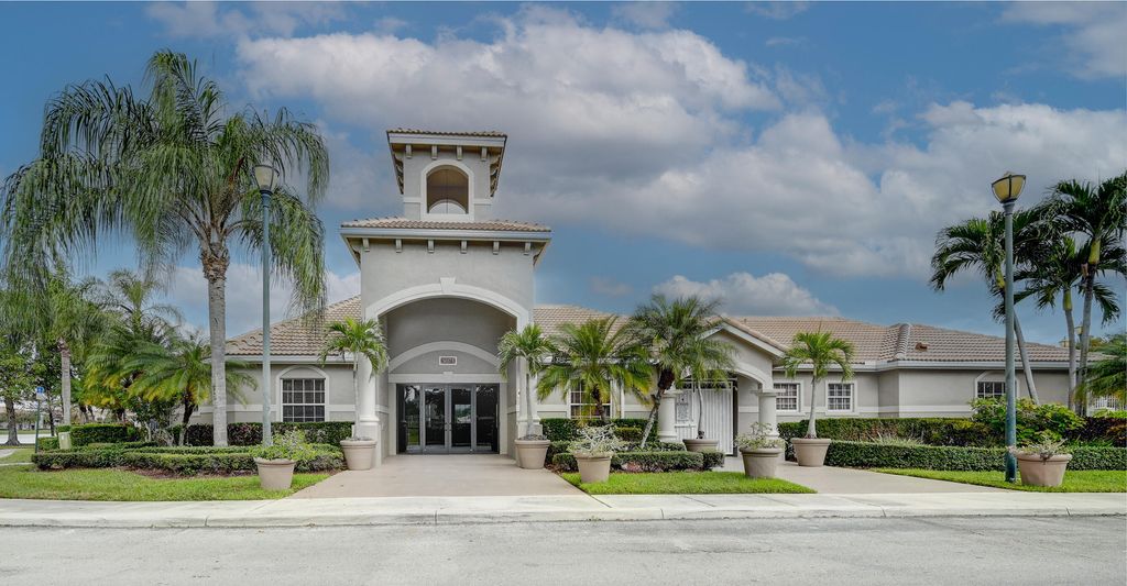 Photo of 5031 Wiles Road #203, Coconut Creek, FL 33073 (MLS # B26008025)