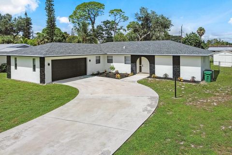 Photo of 417 SE Tranquilla Avenue, Port St Lucie, FL 34983 (MLS # R11127201) Photo of 417 SE Tranquilla Avenue, Port St Lucie, FL 34983 (MLS # R11127201)