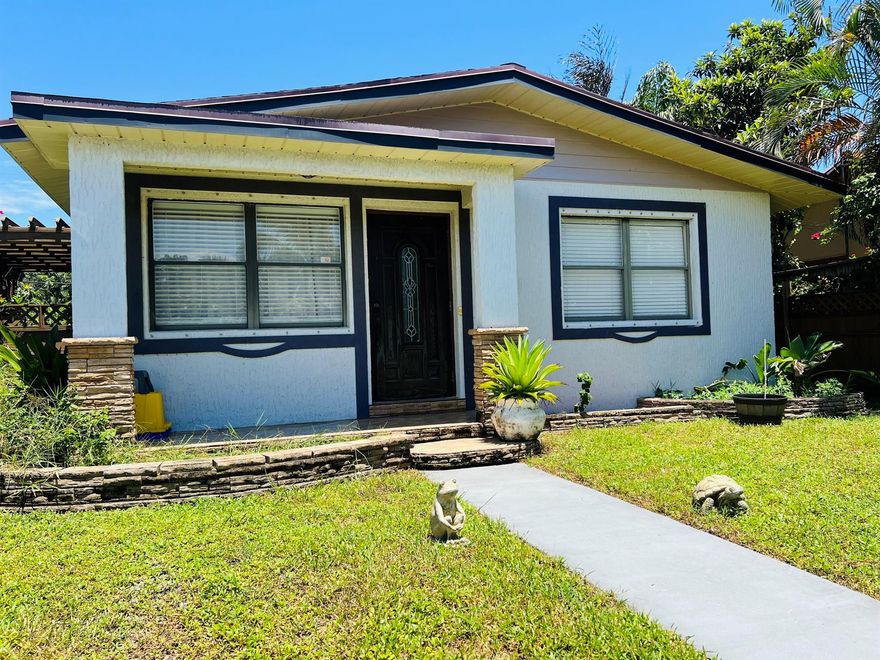 True South Florida Living!  Move-in ready and conveniently located within walking distance from Downtown West Palm, the intracoastal, restaurants, and shopping.  This property is nestled between Flamingo Park, El Cid, and Prospect Park Historic Districts.  This updated 2 bedroom/2 bath home has newer Stainless-Steel appliances, granite countertops, custom tile work throughout, and a newer AC.  The property has a large backyard and sliding gate to a paved access road.  Plenty of room to build a pool or a guest house and store a boat or an RV.