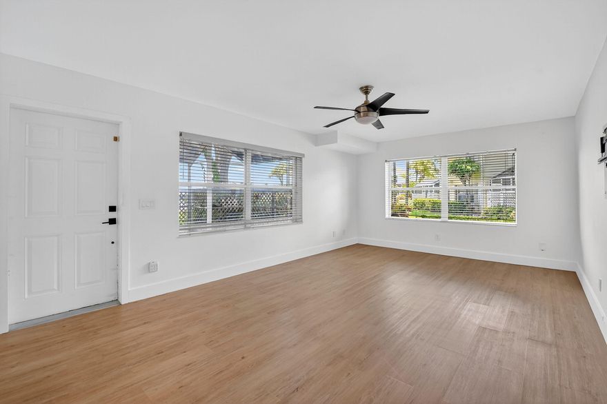 Renovated 2 bedroom 2.5 bathroom townhome with plenty of natural light and lakefront views. This home features laminate flooring throughout the living space. Spacious kitchen with granite countertops, stainless steel appliances and an additional pantry. The bedrooms upstairs feature ensuite bathrooms and have views of the lake. All lighting fixtures and fans have been upgraded. Plenty of storage with standing room above the second bathroom (pull down stairs). The large, screened in patio offers space for a grill, firepit and full size patio set. Enjoy the weather outside with beautiful views of the lake and sunset. Located in the desirable Wellesley community with 24 hour manned security, community pool and hot tub. Make your appointment to view your next home today!