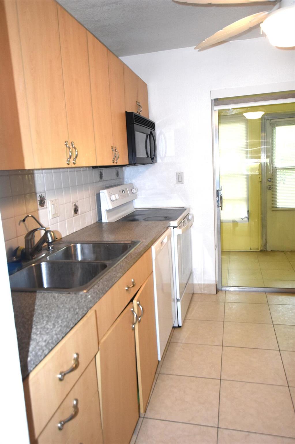 ORIOLE GARDENS THREE 77 C - Residential