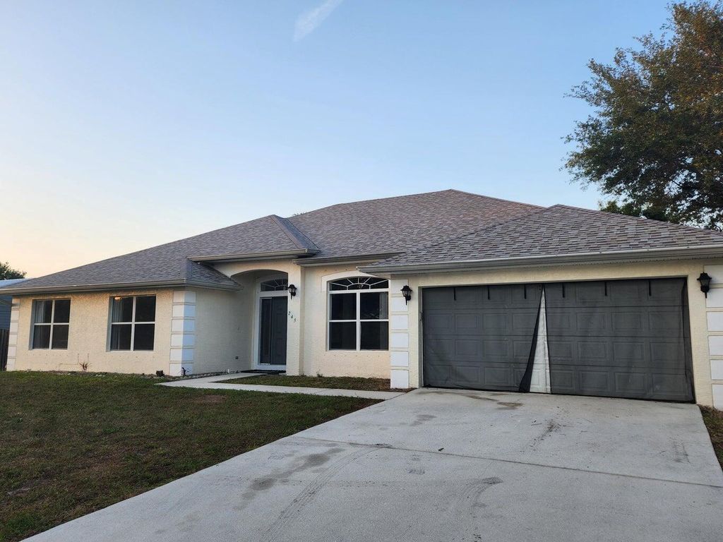 Photo of 245 SW Tulip Boulevard, Port Saint Lucie, FL 34953 (MLS # R11090770)
