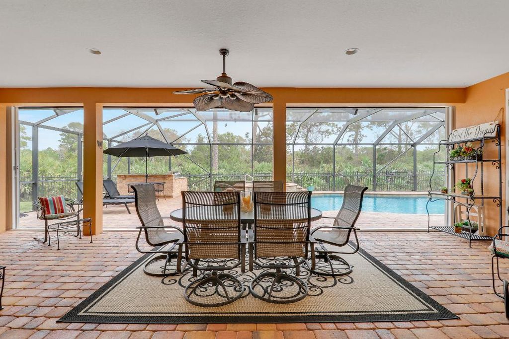 Photo of 3055 NW Stoney Creek Avenue, Jensen Beach, FL 34957 (MLS # R11158275)