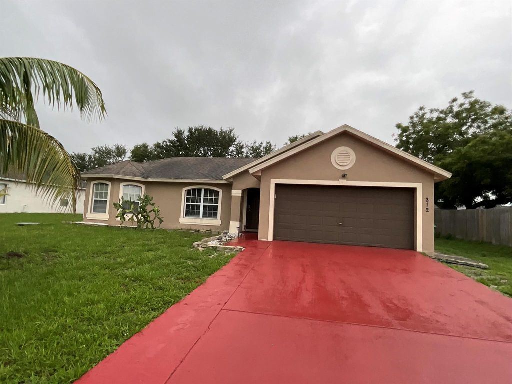 Photo of 212 SW Yager Place, Port Saint Lucie, FL 34953 (MLS # R11099508)