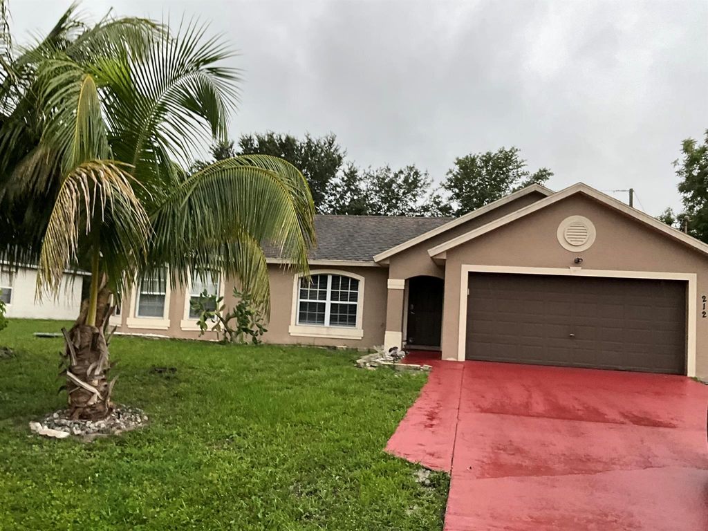Photo of 212 SW Yager Place, Port Saint Lucie, FL 34953 (MLS # R11099508)