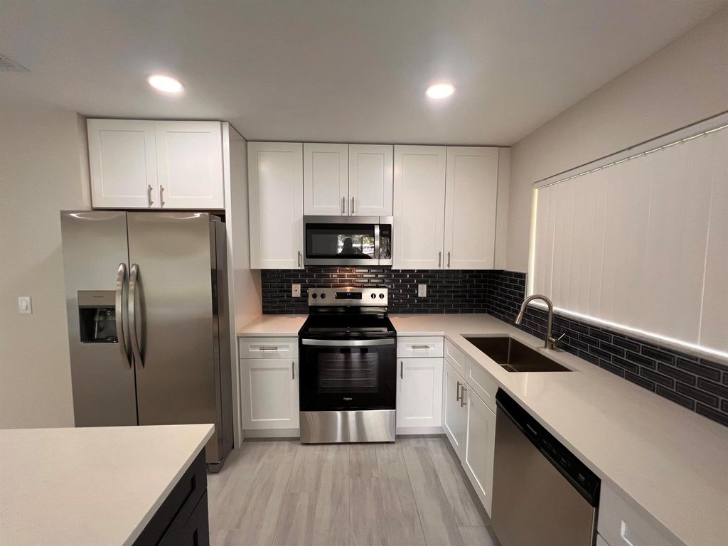 Photo of 1742 SE Burgundy Lane, Port Saint Lucie, FL 34952 (MLS # R11021845)