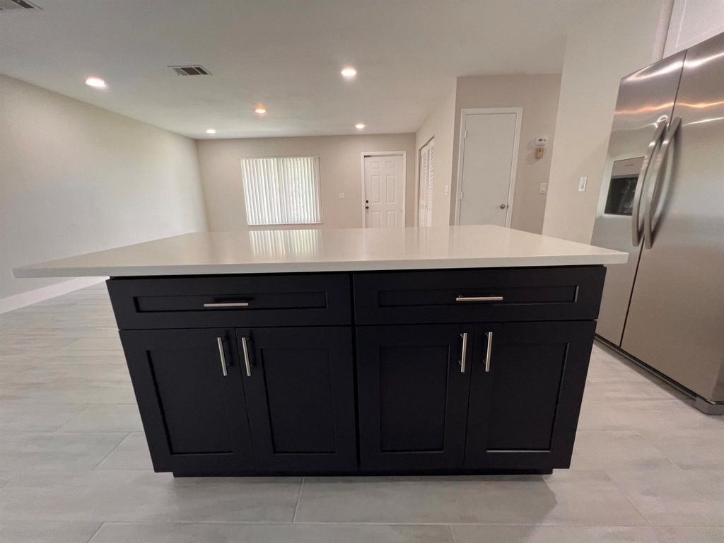 Photo of 1742 SE Burgundy Lane, Port Saint Lucie, FL 34952 (MLS # R11021845)