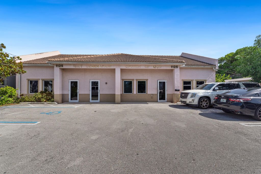Photo of 1125 Crestwood Boulevard, Lake Worth Beach, FL (MLS # B26057455)
