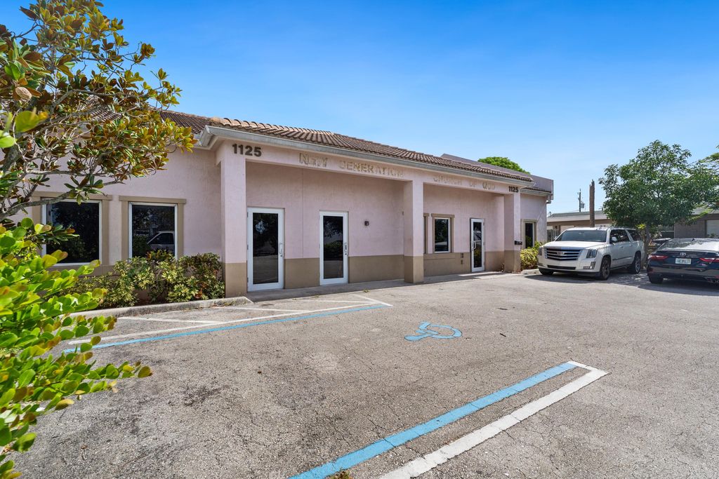 Photo of 1125 Crestwood Boulevard, Lake Worth Beach, FL (MLS # B26057455)