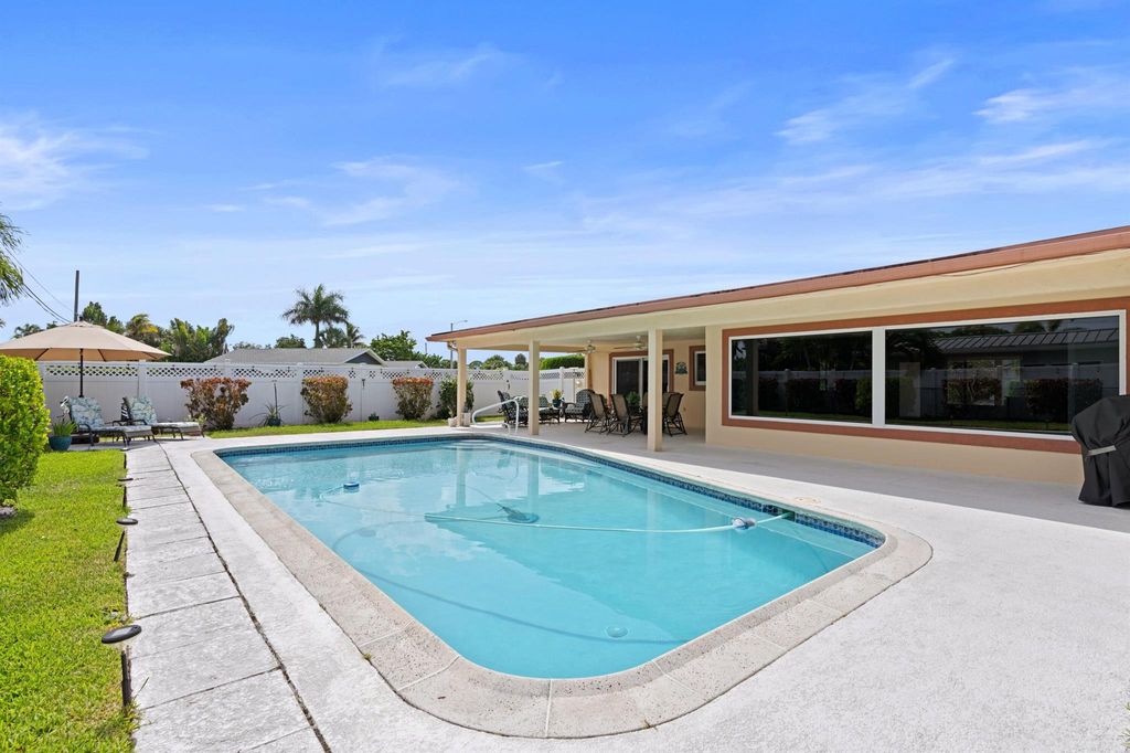 Photo of 1098 W Camino Real Real, Boca Raton, FL 33486 (MLS # R11002120)