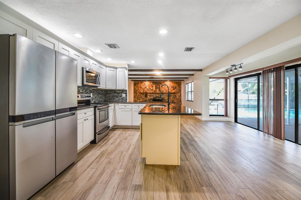 Photo of 8385 NW 14 Street, Coral Springs, FL 33065 (MLS # R11134308)
