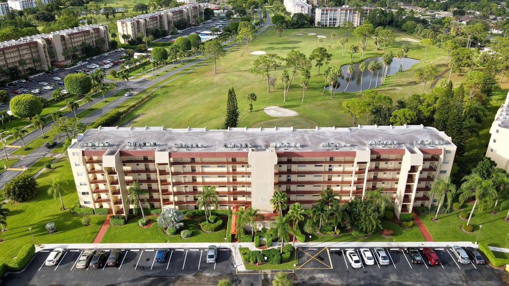 Photo of 3836 Via Poinciana #506, Lake Worth, FL 33467 (MLS # R11095472)