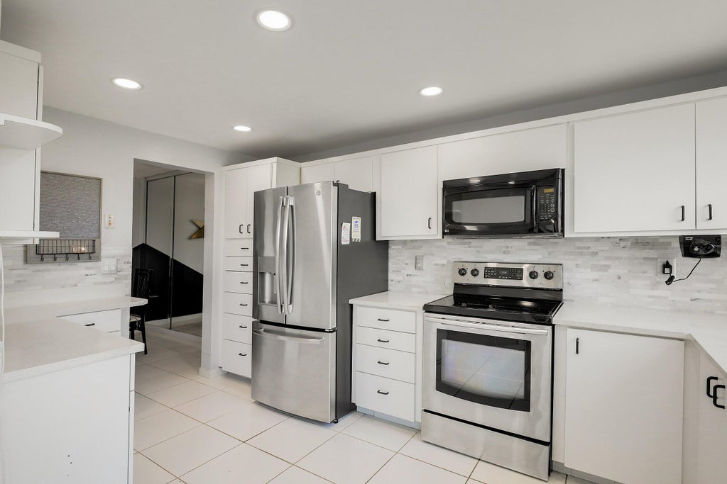 Photo of 3836 Via Poinciana #506, Lake Worth, FL 33467 (MLS # R11095472)