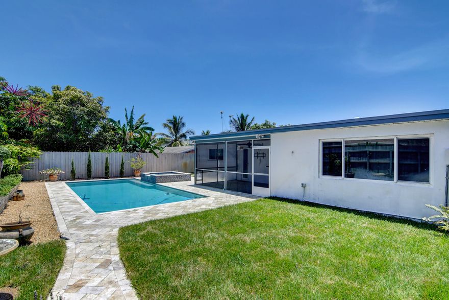 The ultimate Florida home, and backyard! This updated single family no HOA home is available for immediate annual rental. Large oversized circle driveway with plenty of room for multiple cars, boat or RV, also has 1 car garage. There are 3 large split floorplan bedrooms, and 2 full bathrooms, one is a cabana bath with easy access to the pool. Master bedroom features an updated on suite with double vanity sinks. Plenty of storage inside including a large laundry room with a new washer and dryer. Fully updated kitchen, and new appliances, with a great pass through window to the spacious screened patio, and a separate dining room. The best part about this home is the gorgeous backyard! It is fully fenced with gates on both side yards. Plenty of grass for your pets to enjoy. A raised stone patio, updated stone pool deck, and a beautiful large heated pool, and spa. No storm protection needed if there is a hurricane the entire house has impact windows. Rent includes pool service, landscaping, pest control, and x2/year AC maintenance. Renters insurance is required.