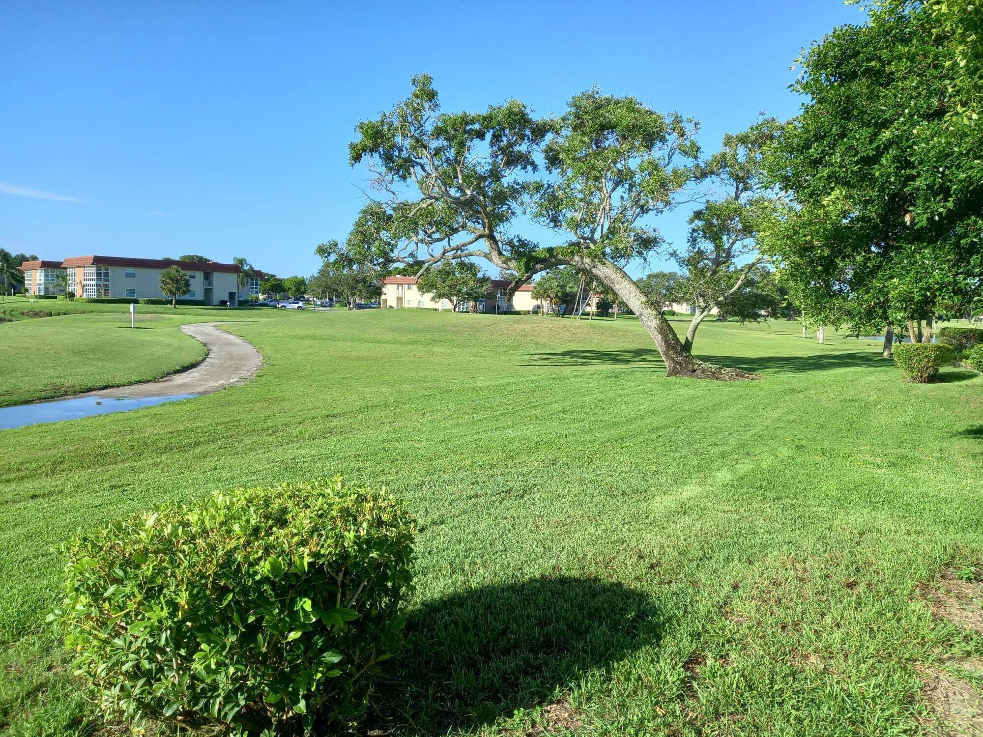 Welcome to this beautifully Updated 2/2 Furnished Condo - Vista Royale (55+ Active Community). Beautifully decorated first-floor, community just minutes from the beach! This unit is fully furnished, updated, and move-in ready, featuring deluxe faux wood linoleum flooring throughout. Enjoy privacy and serene views as the condo backs up to the golf course. Just steps away from one of four community clubhouses, you'll have convenient access to all the incredible amenities Vista Royale offers.🏌️‍♂️ Public golf course🍽️ On-site restaurant🏊 4 heated pools & clubhouses🏋️ Fitness center📚 Library🎨 Craft room & workshop🎾 Tennis & pickleball courts🎯 Shuffleboard🎉 Active