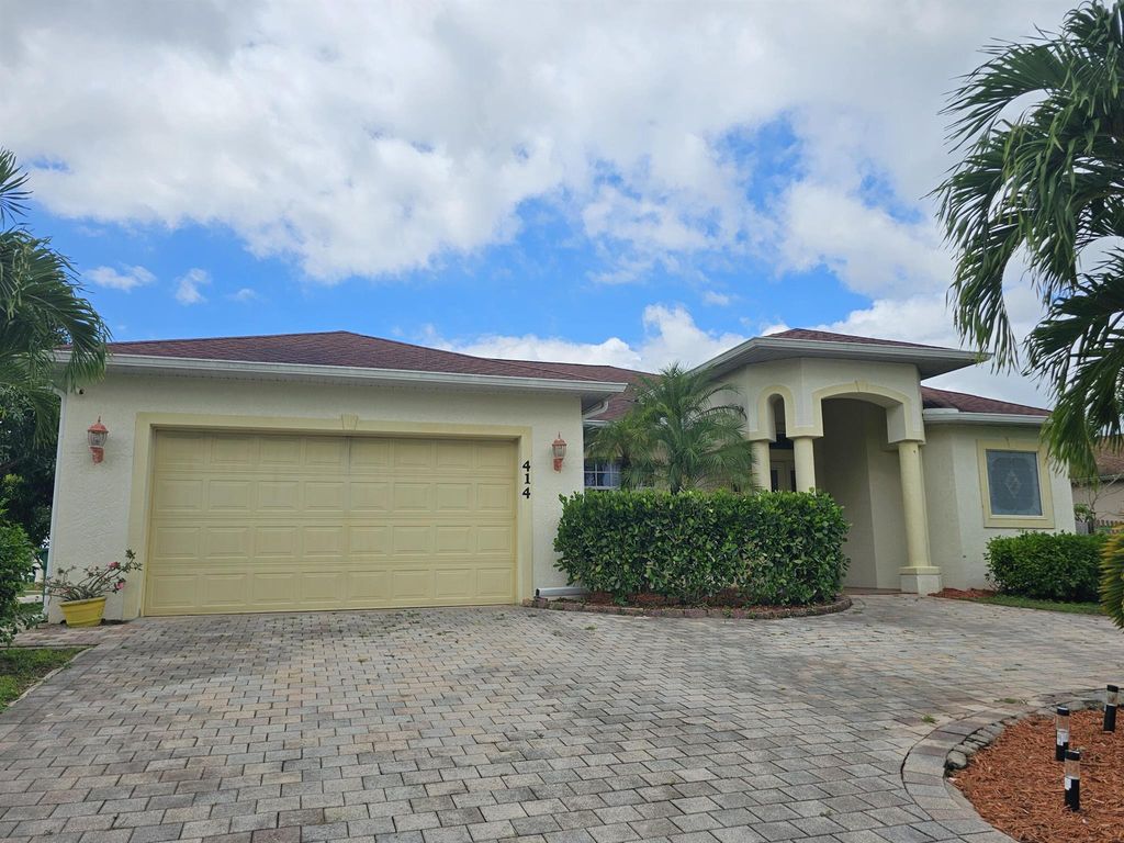 Photo of 414 SW Cherry Hill Road, Port Saint Lucie, FL 34953 (MLS # R11120138)