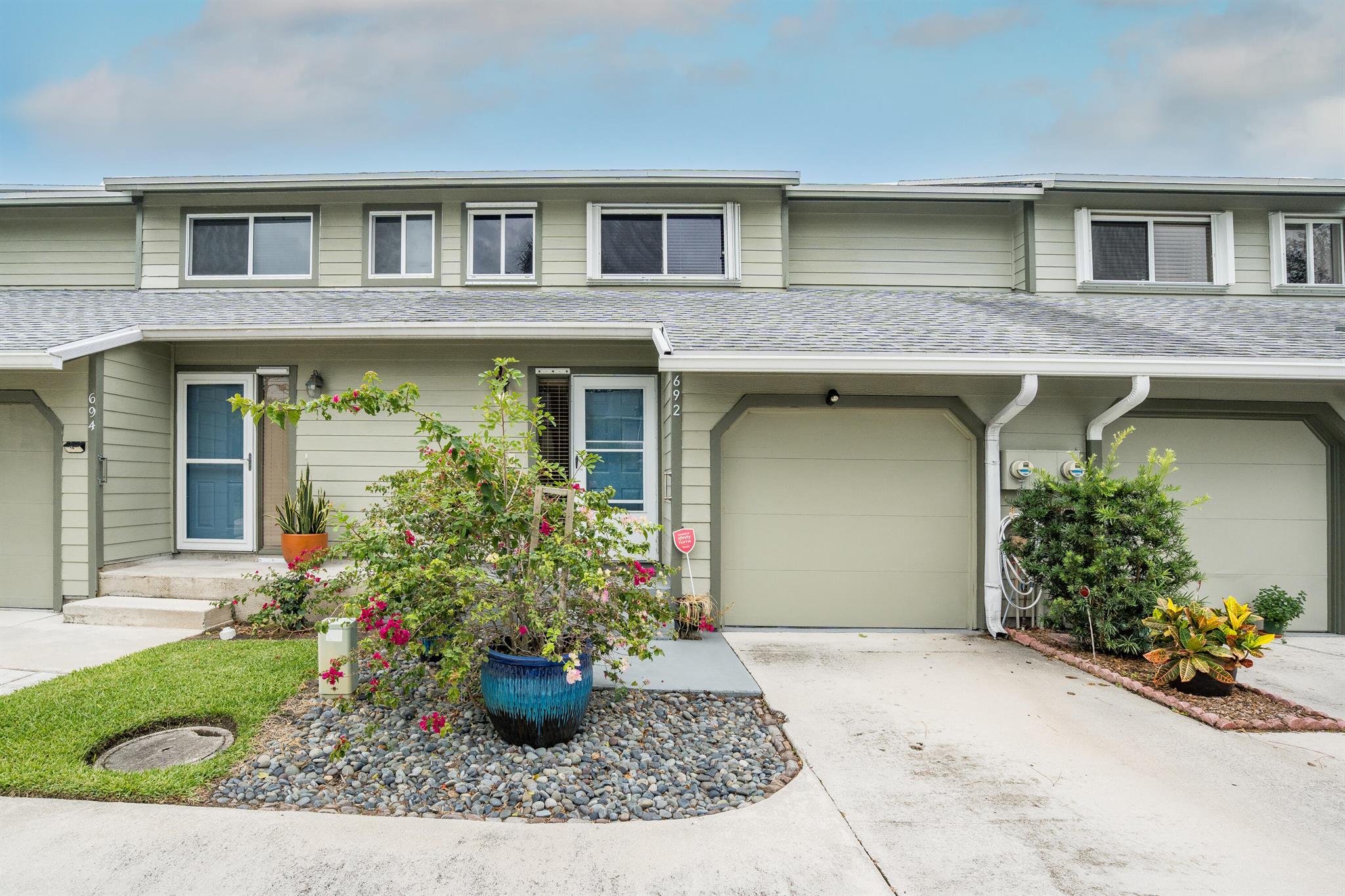 WOW HUGE PRICE REDUCTION! Great opportunity to live in Jensen Beach!!! This townhome is located in the desirable community of Holly Creek, it was updated just a few years ago. Roof 2018, Newer AC. 2018 Appliances. Updated Cabinets, Granite Countertops,. Newer Fixtures & Fans, Enclosed Tiled Patio, Wood Ceiling. Beautifully Landscaped back yard, French Doors, Water Resistant Laminate Flooring on the First Floor, Vinyl Tile Upstairs. The Community offers a Social Clubhouse with Swimming Pool, Tennis Courts & Pickle Ball. Trucks Allowed Parked in Garage Only. Walk/Bike to Downtown Jensen Beach which is nestled on The Indian River. Enjoy Music, Festivals, Restaurants, Shops, Beaches and More! Sorry no rentals.