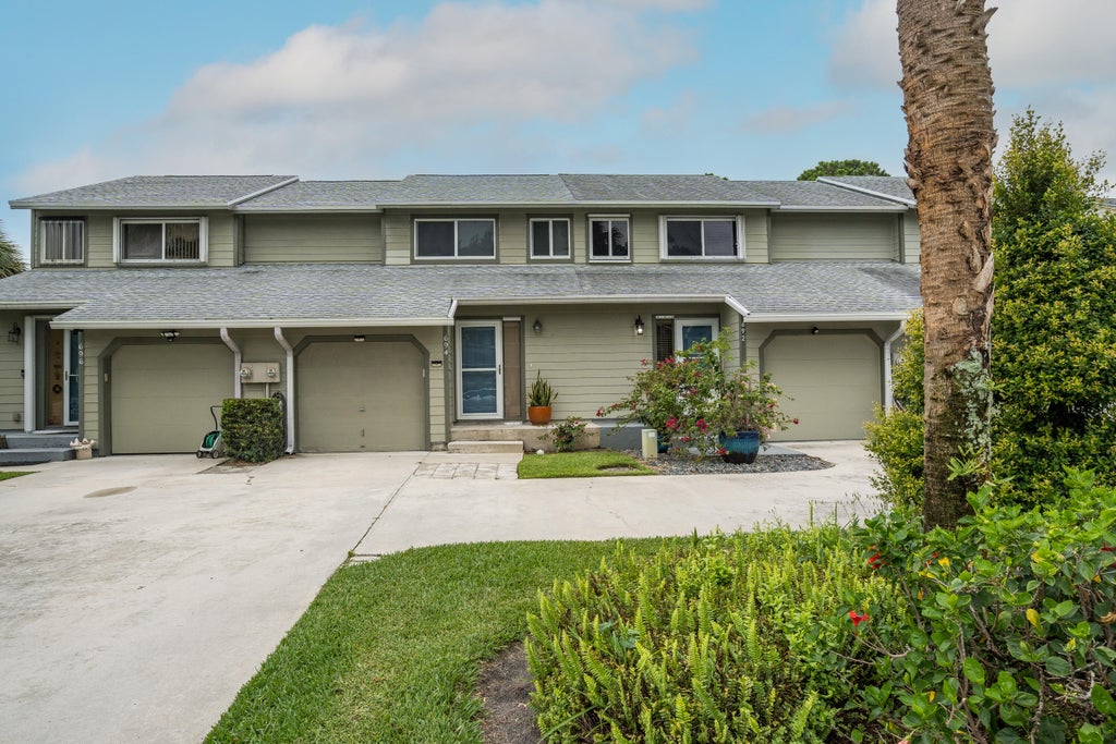 Photo of 692 NE Wax Myrtle Way, Jensen Beach, FL 34957 (MLS # R10988303)