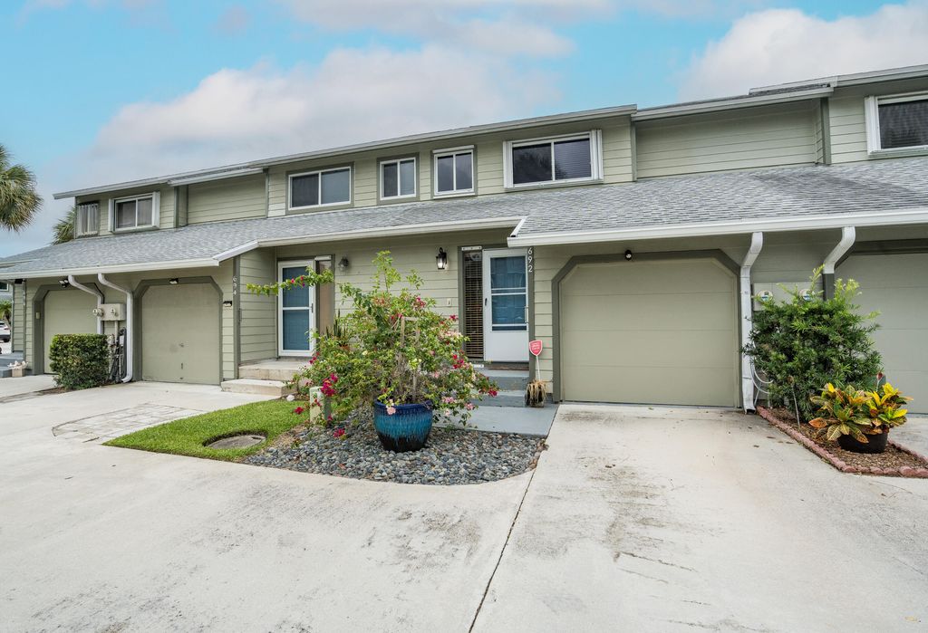 Photo of 692 NE Wax Myrtle Way, Jensen Beach, FL 34957 (MLS # R10988303)